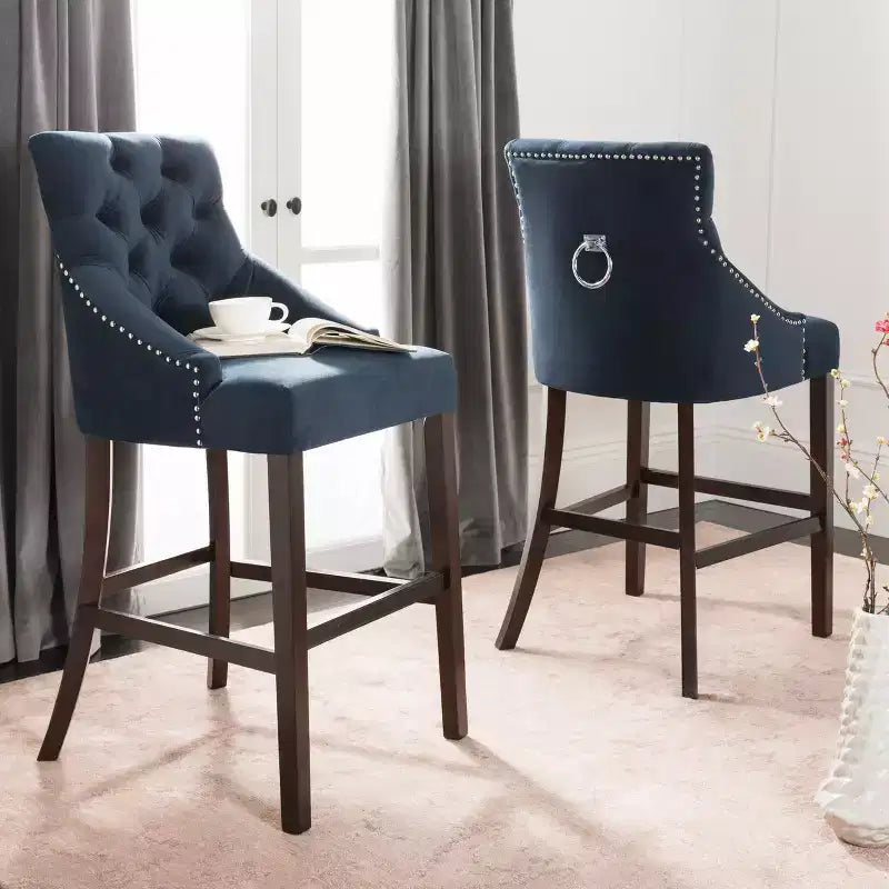 Tabouret de bar à dossier ailé capitonné