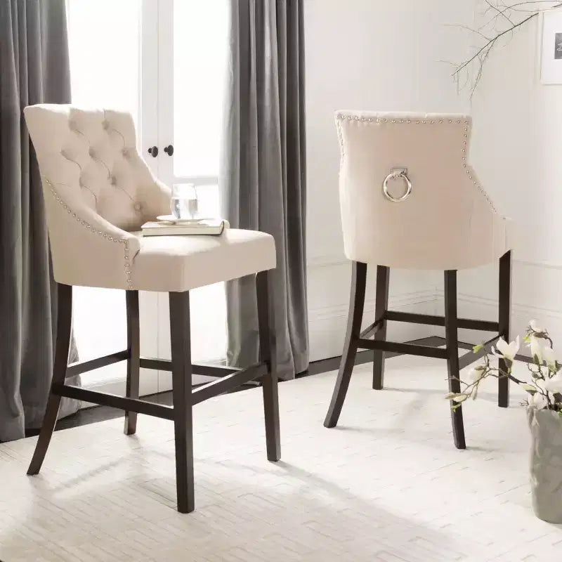 Tabouret de bar à dossier ailé capitonné