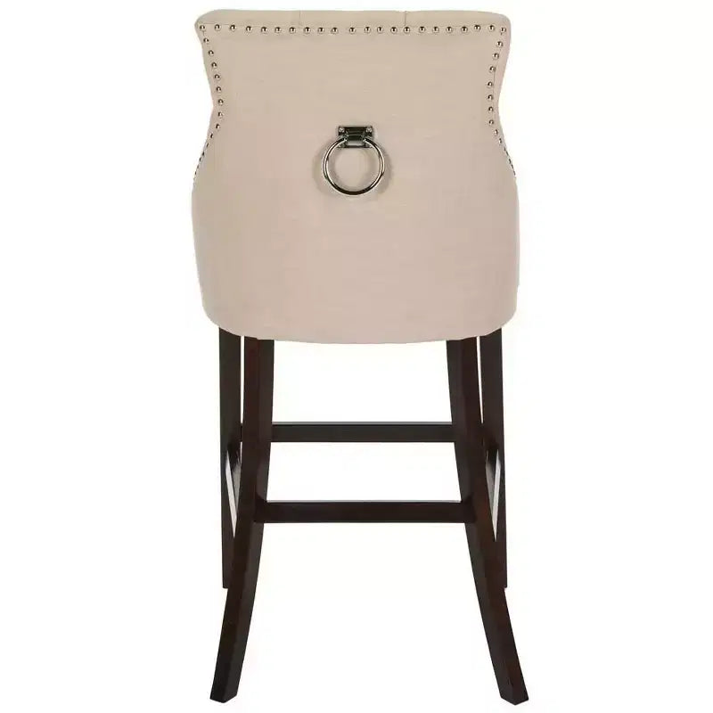 Tabouret de bar à dossier ailé capitonné